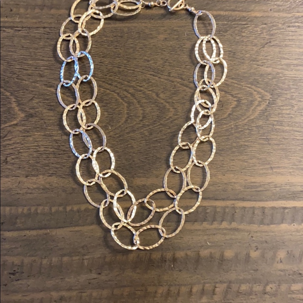 Gold necklace.